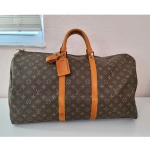 Louis Vuitton Keepall Bandoulière 55 Duffle Bag